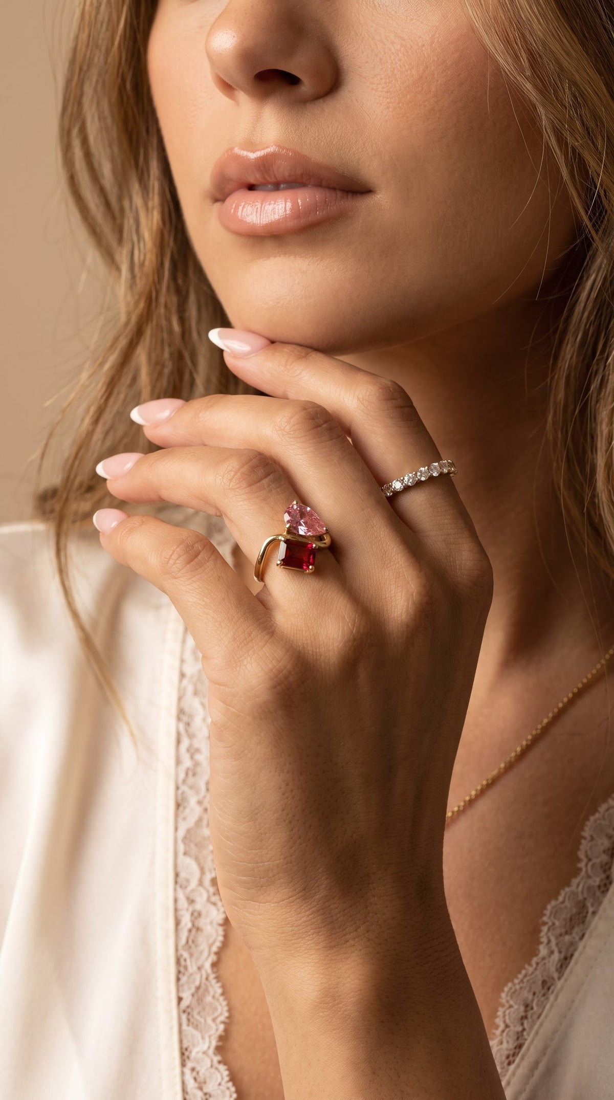 Toi et Moi open intertwined birthstone ring worn on the hand